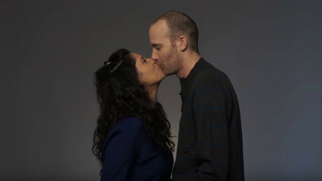 A scene from the kissing video 